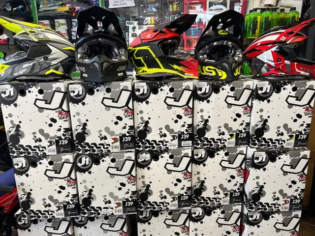 JUST1 helmets stacked on new stock boxes